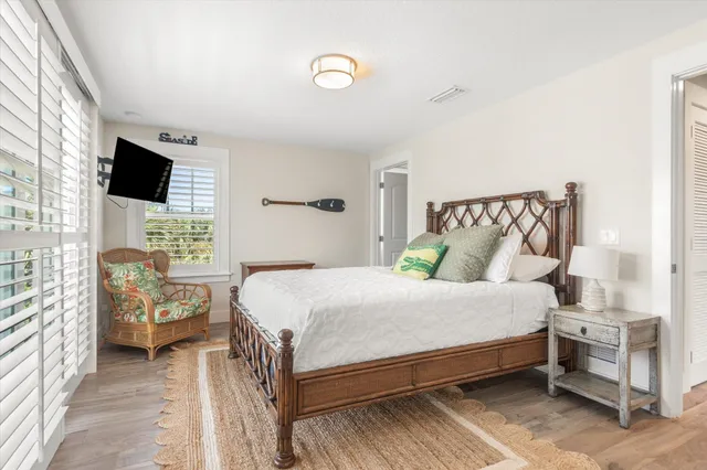 a view of a balcony with an outdoor seating