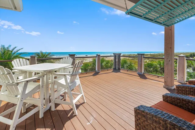 a living room with furniture fireplace and a flat screen tv