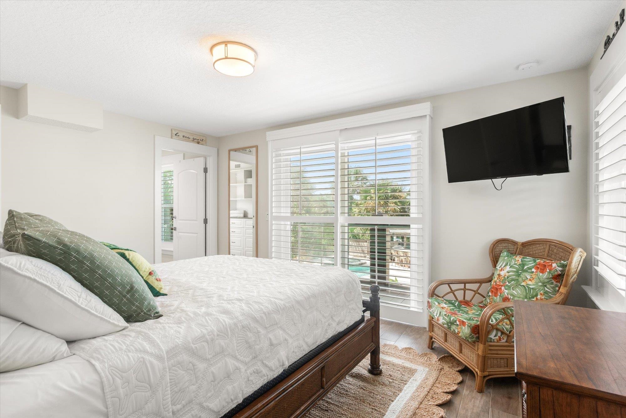 1 2nd Lane St. Augustine, FL 32080 - Photo 41 of 86 a bedroom with a bed and a tv