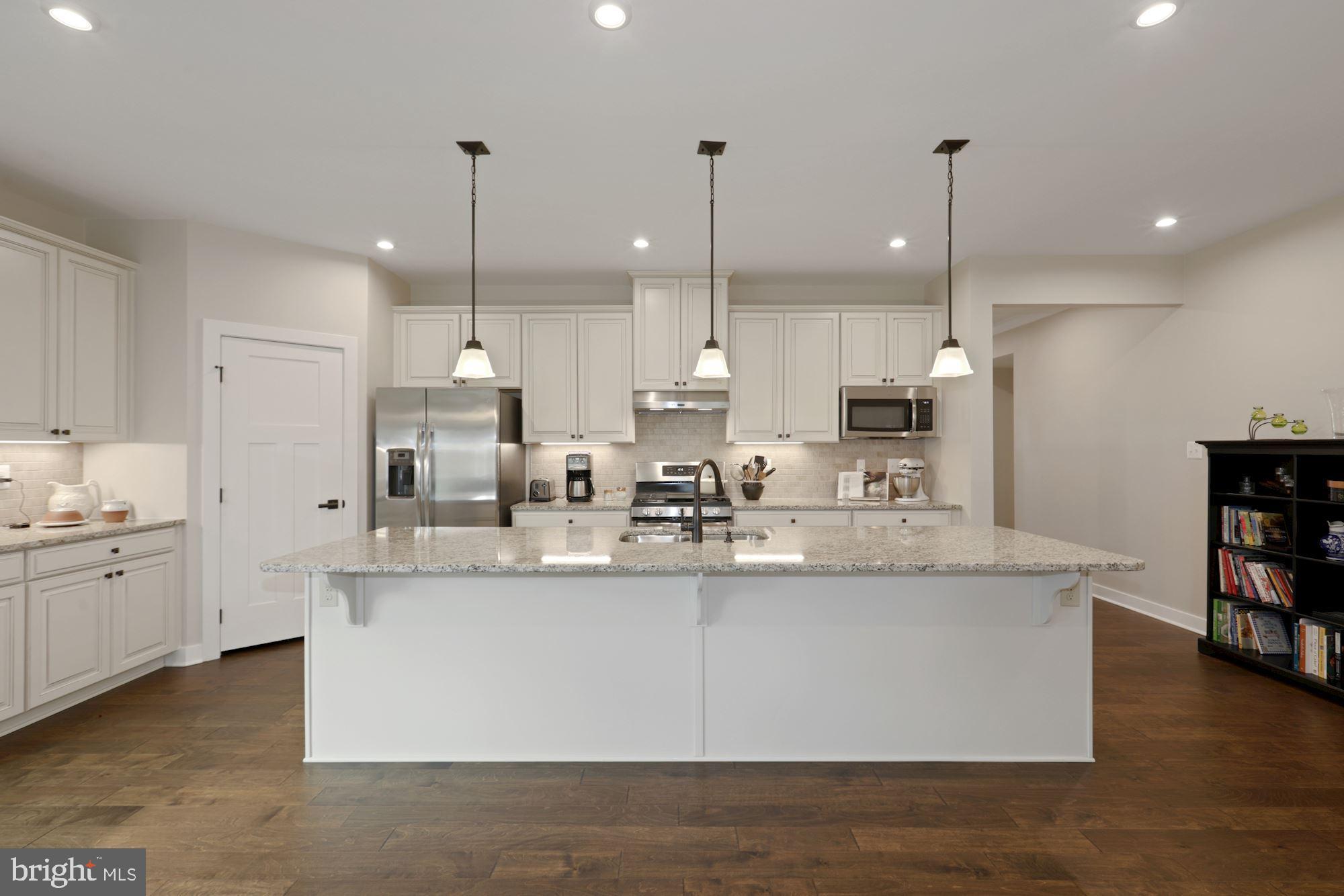 23576 Robalo Road Frankford, DE 19945 - Photo 10 of 47 Gourmet Kitchen | Decorative Pendant Lighting