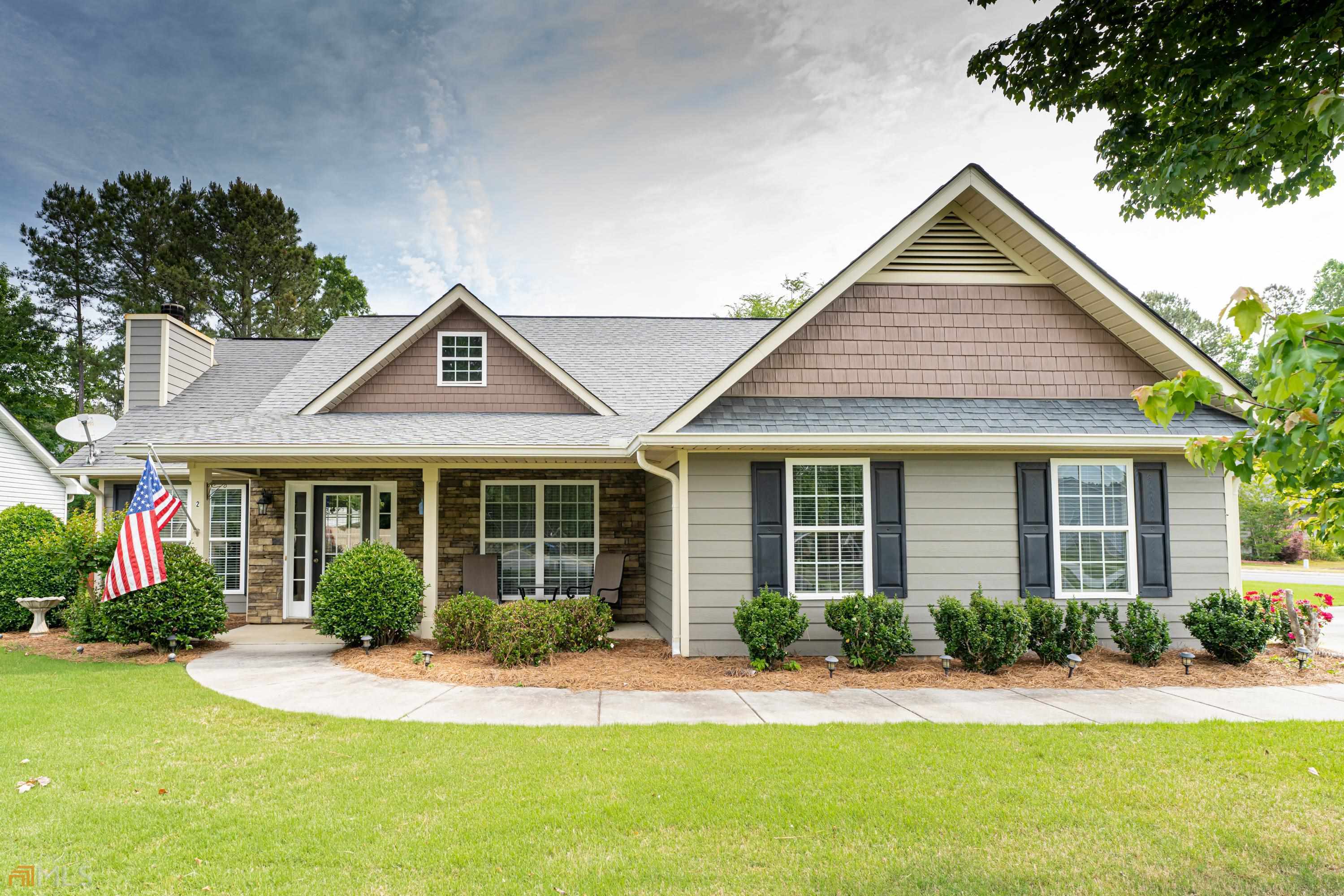 2 Marble Street Northeast Rome, GA 30161 - Photo 1 of 1 a front view of a house with a yard and potted plants