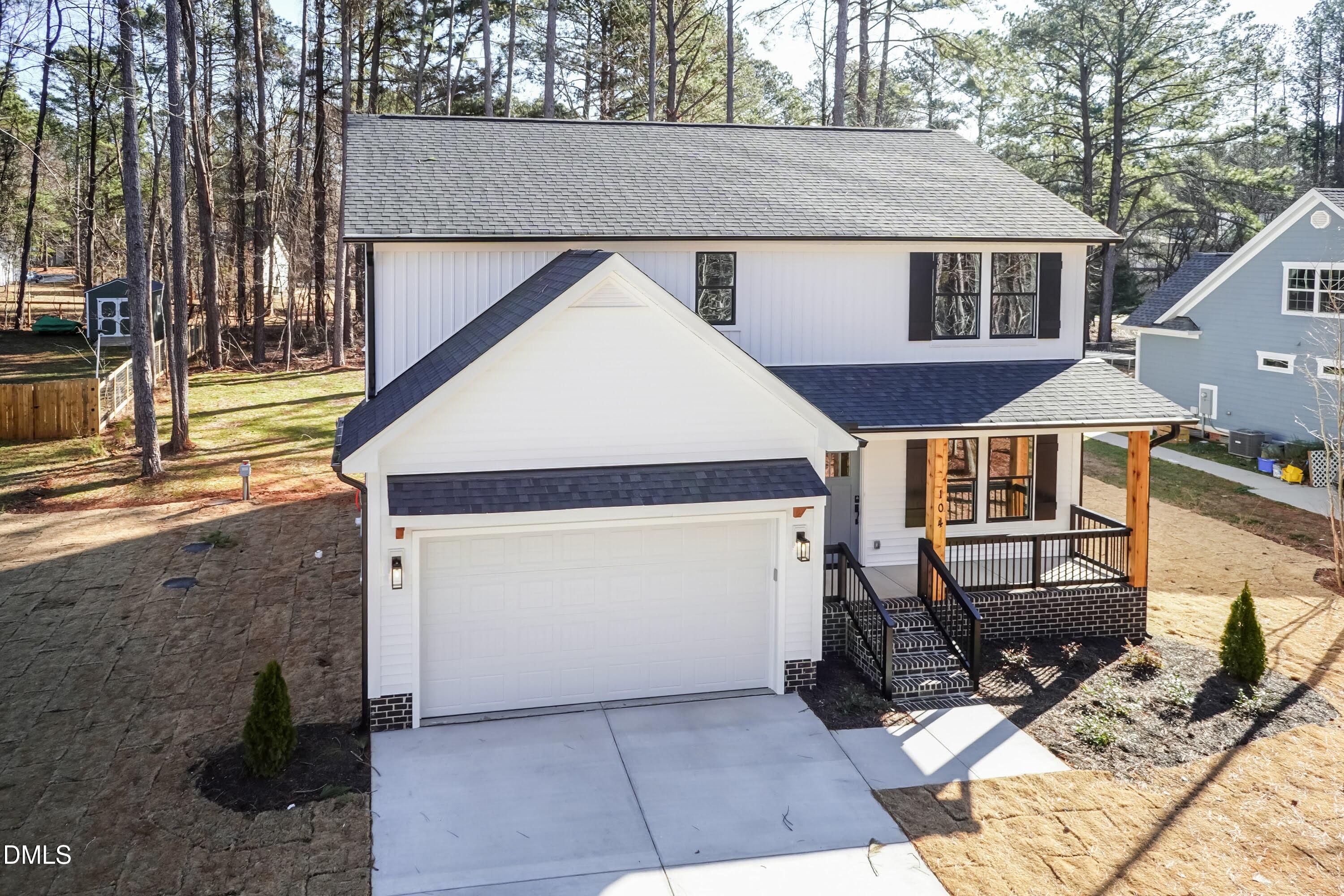 104 Buffalo Drive Spring Hope, NC 27882 - Photo 4 of 48 a front view of a house with cars