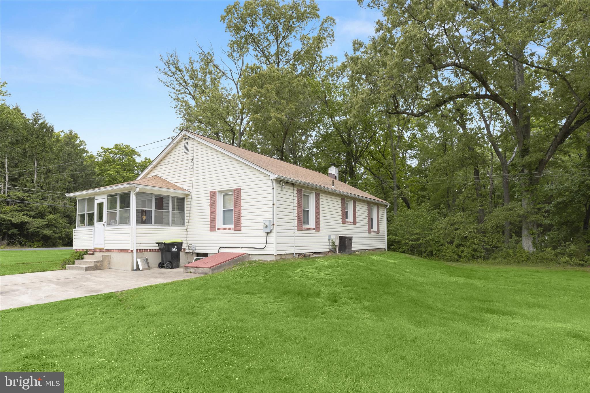 3703 Clayton Road Joppa, MD 21085 - Photo 27 of 31 a front view of house with yard and green space