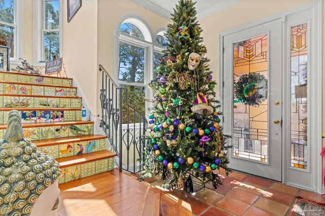 a view of entryway with flower pots