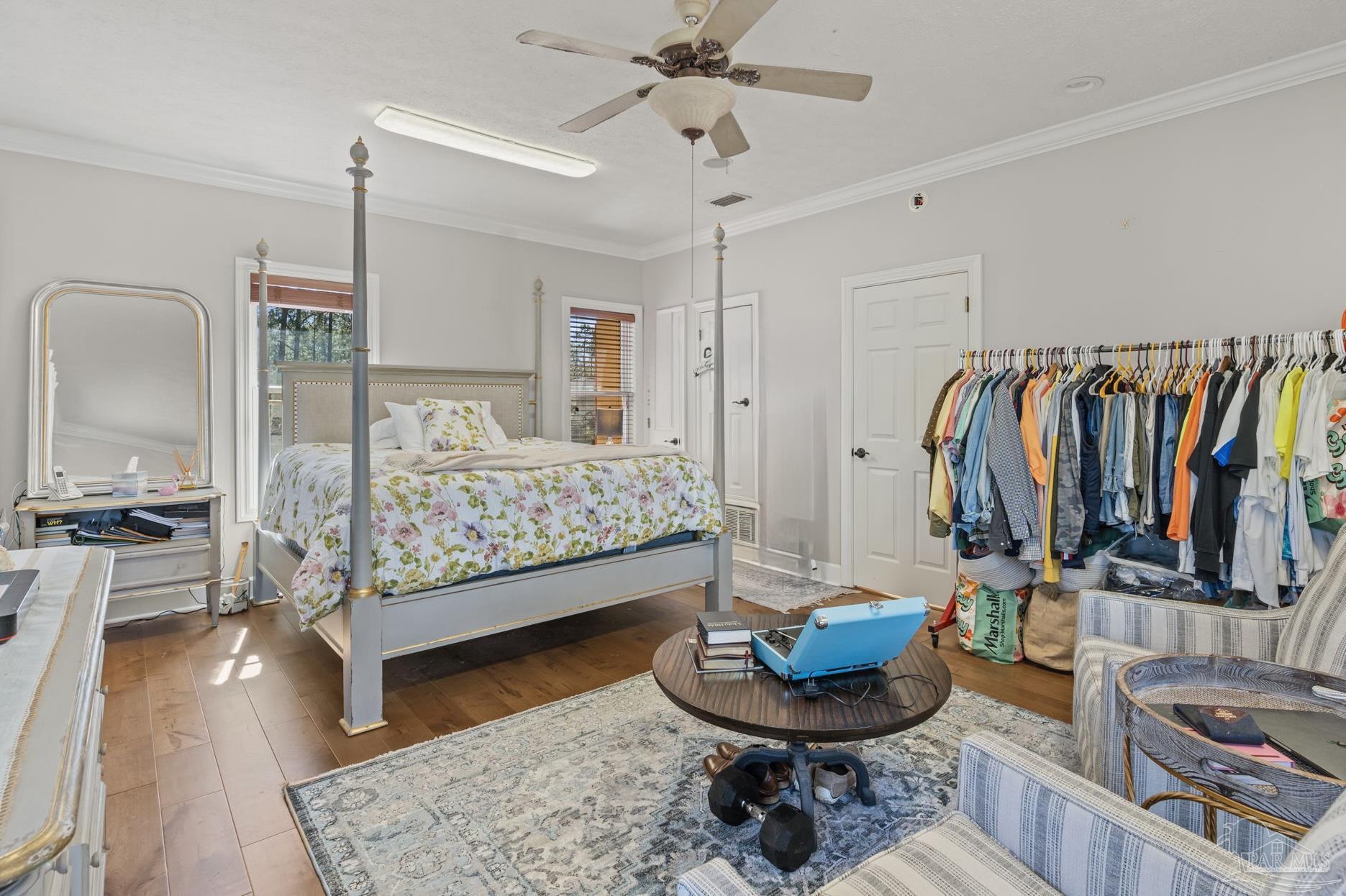 5460 North Shore Road Pensacola, FL 32507 - Photo 25 of 49 a living room with furniture and a wooden floor