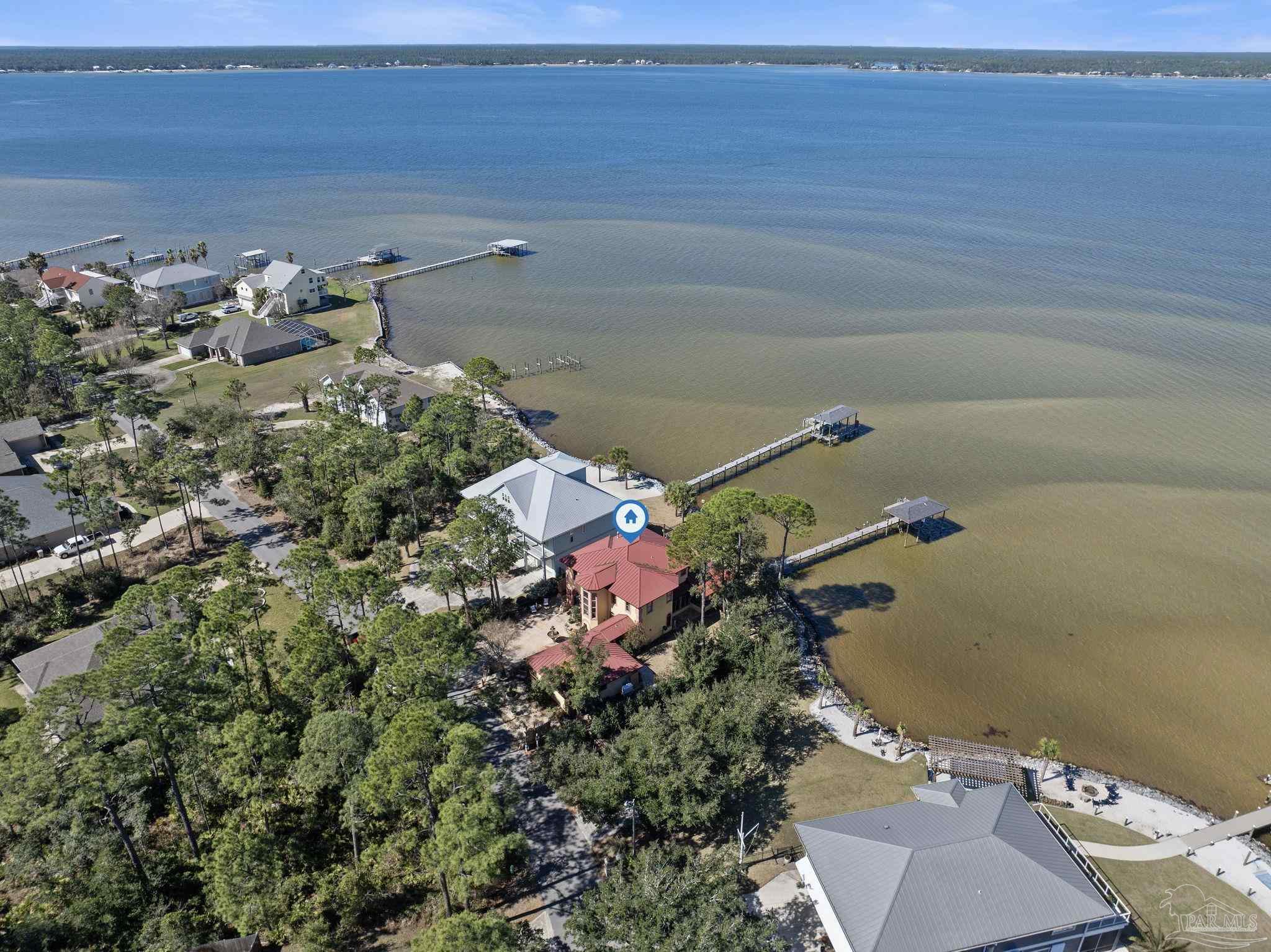 5460 North Shore Road Pensacola, FL 32507 - Photo 44 of 49 an aerial view of a house with a lake view