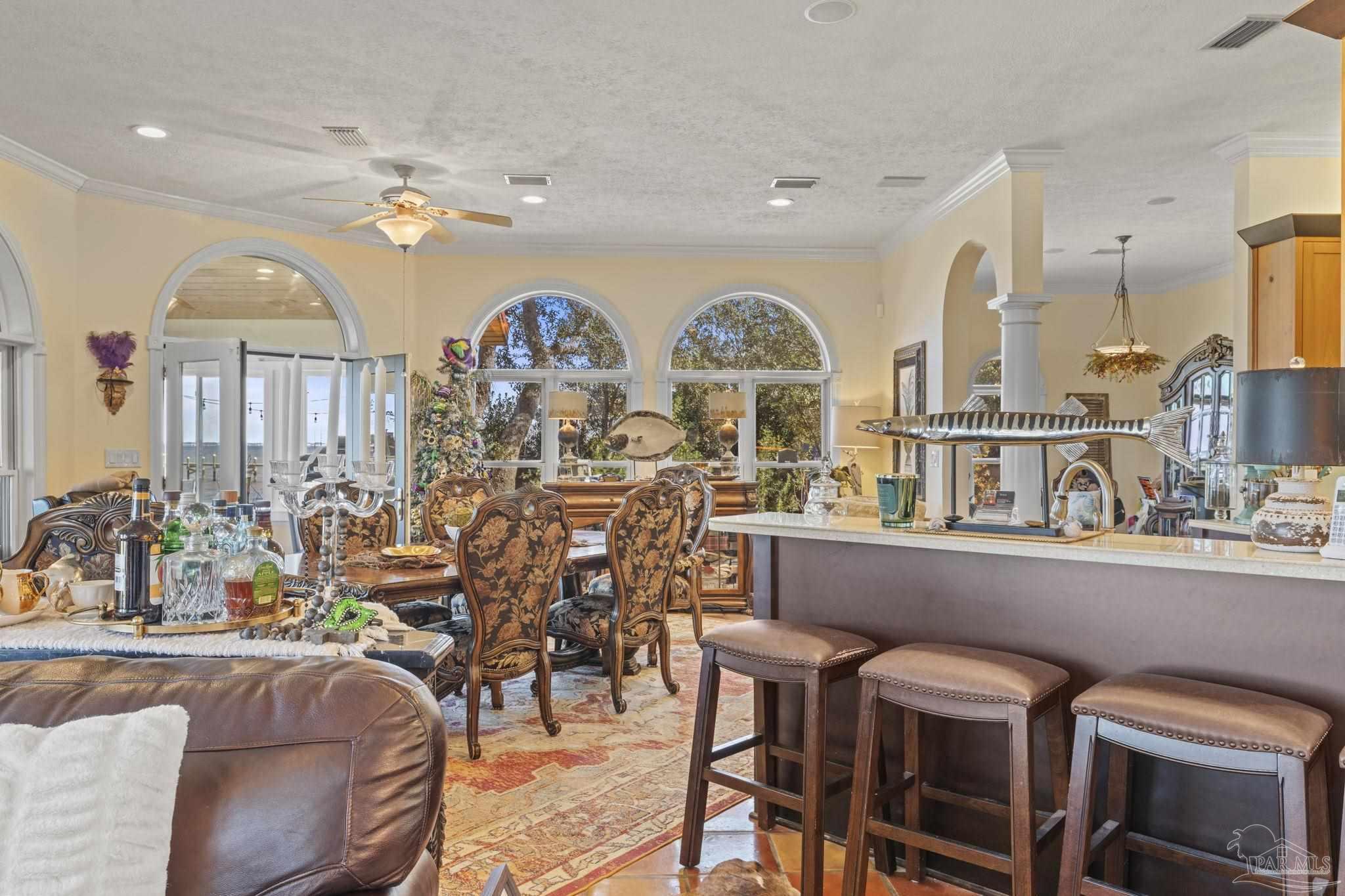5460 North Shore Road Pensacola, FL 32507 - Photo 6 of 49 a view of a livingroom with furniture window and wooden floor