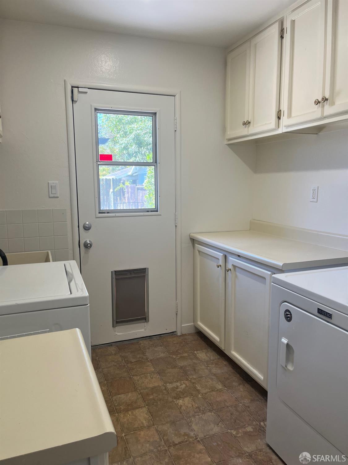 5880 Olinda Road El Sobrante, CA 94803 - Photo 19 of 31 Laundry room with backyard access