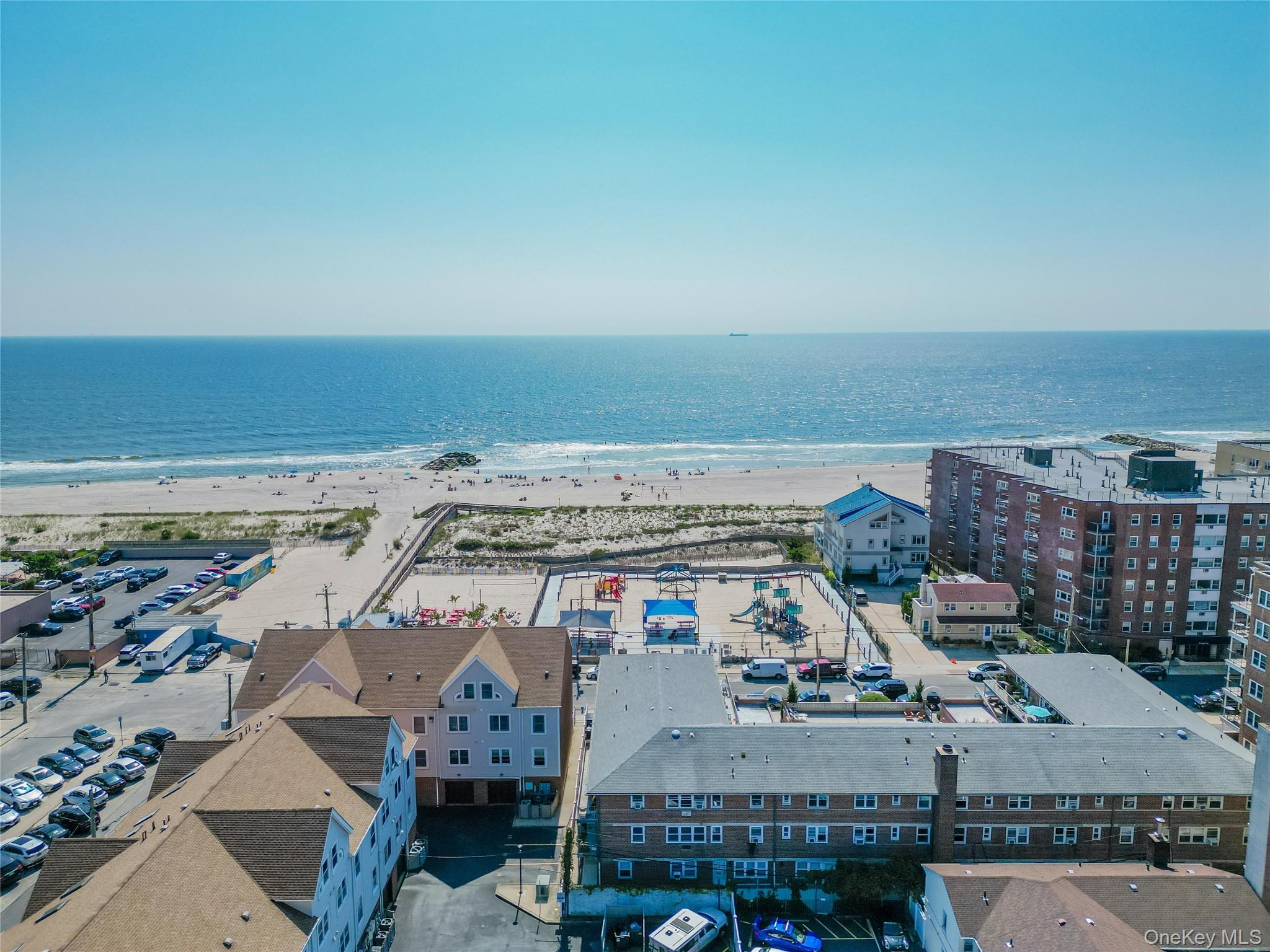 765 Shore Road, Unit 1M Long Beach, NY 11561 - Photo 11 of 12 Drone / aerial view of expansive coastline