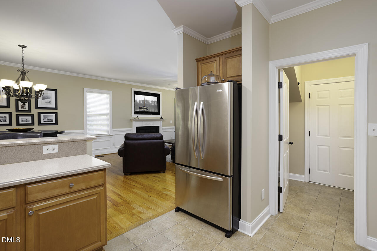 97 Bounty Circle Angier, NC 27501 - Photo 16 of 43 a kitchen with stainless steel appliances granite countertop a refrigerator and a sink