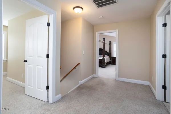 a view of hallway with livingroom