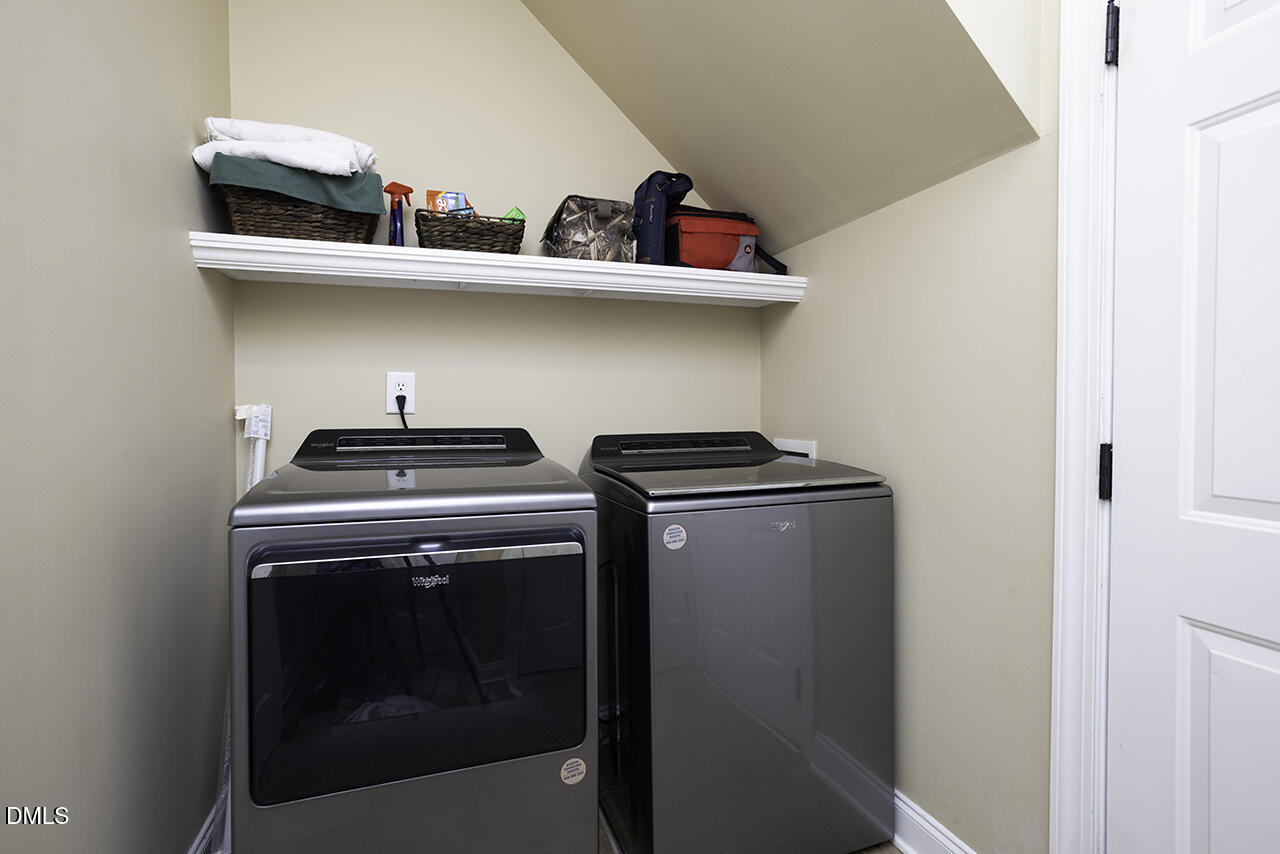 97 Bounty Circle Angier, NC 27501 - Photo 34 of 43 a utility room with dryer and washer