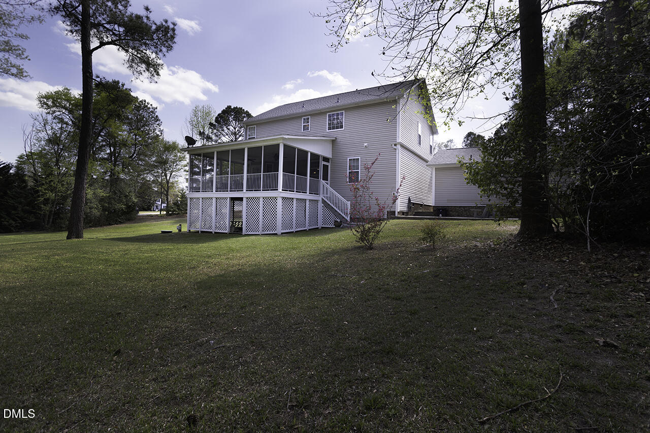 97 Bounty Circle Angier, NC 27501 - Photo 39 of 43 a view of a house with a yard