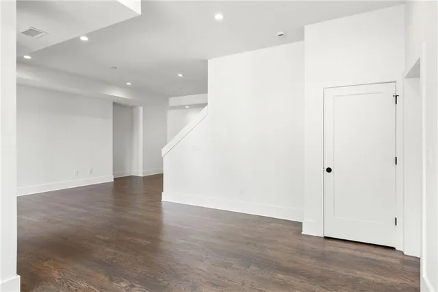 a view of a livingroom with wooden floor