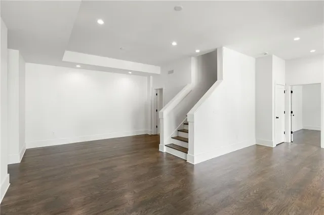 a view of entryway with wooden floor