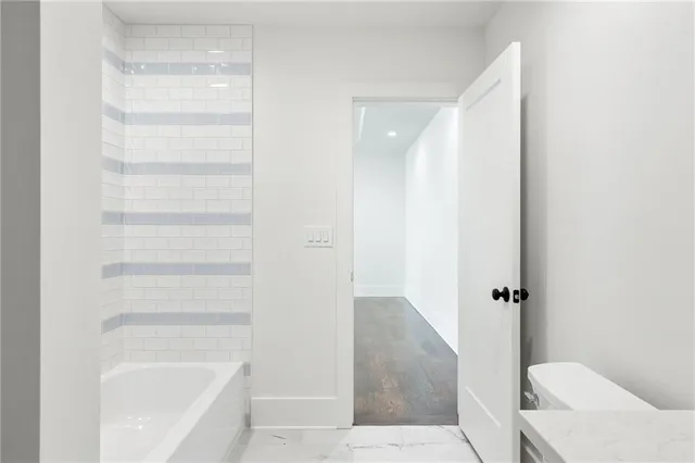 a bathroom with a bathtub