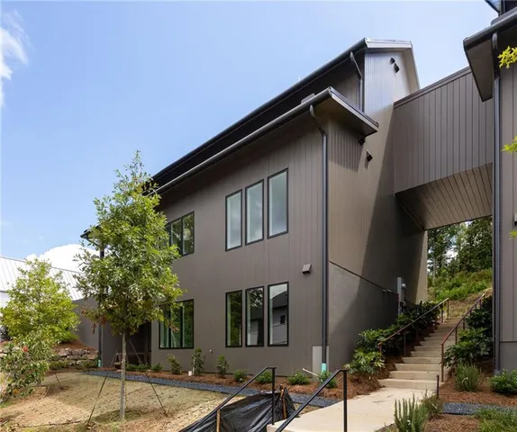 a house with trees in front of it