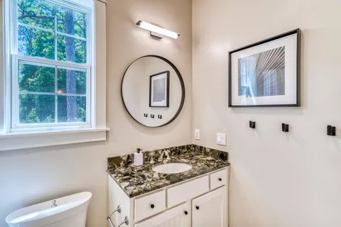 a bathroom with a shower and a tub