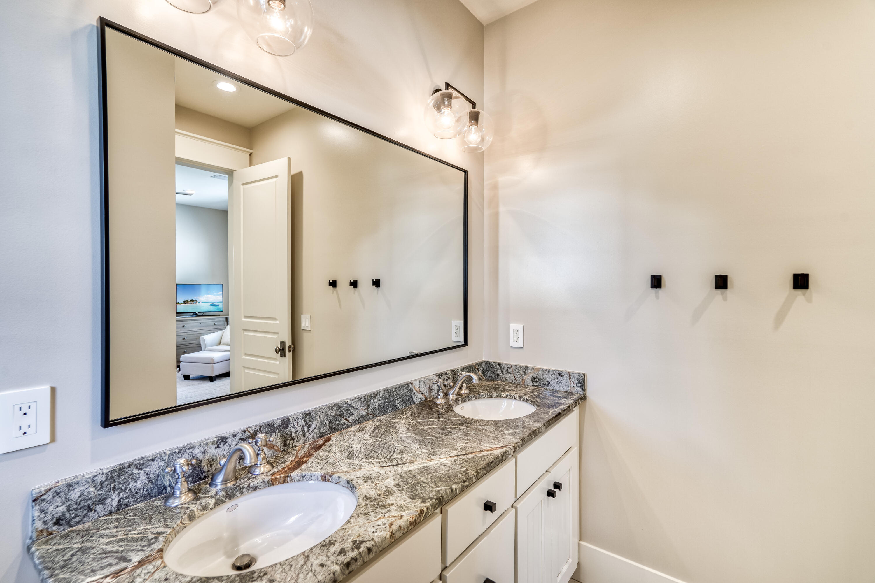 47 Hammock Lane Santa Rosa Beach, FL 32459 - Photo 49 of 51 a bathroom with a granite countertop sink and a mirror