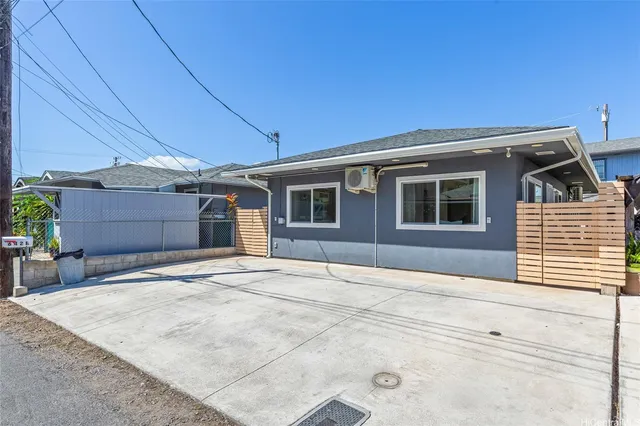 a front view of a house with garage