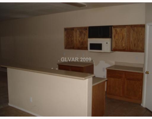 5948 Crumbling Ridge Street Henderson, NV 89011 - Photo 5 of 10 Kitchen.