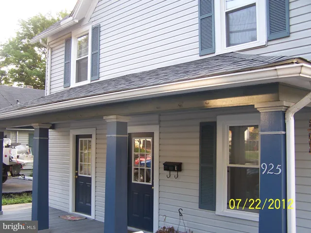 a front view of a house with a door