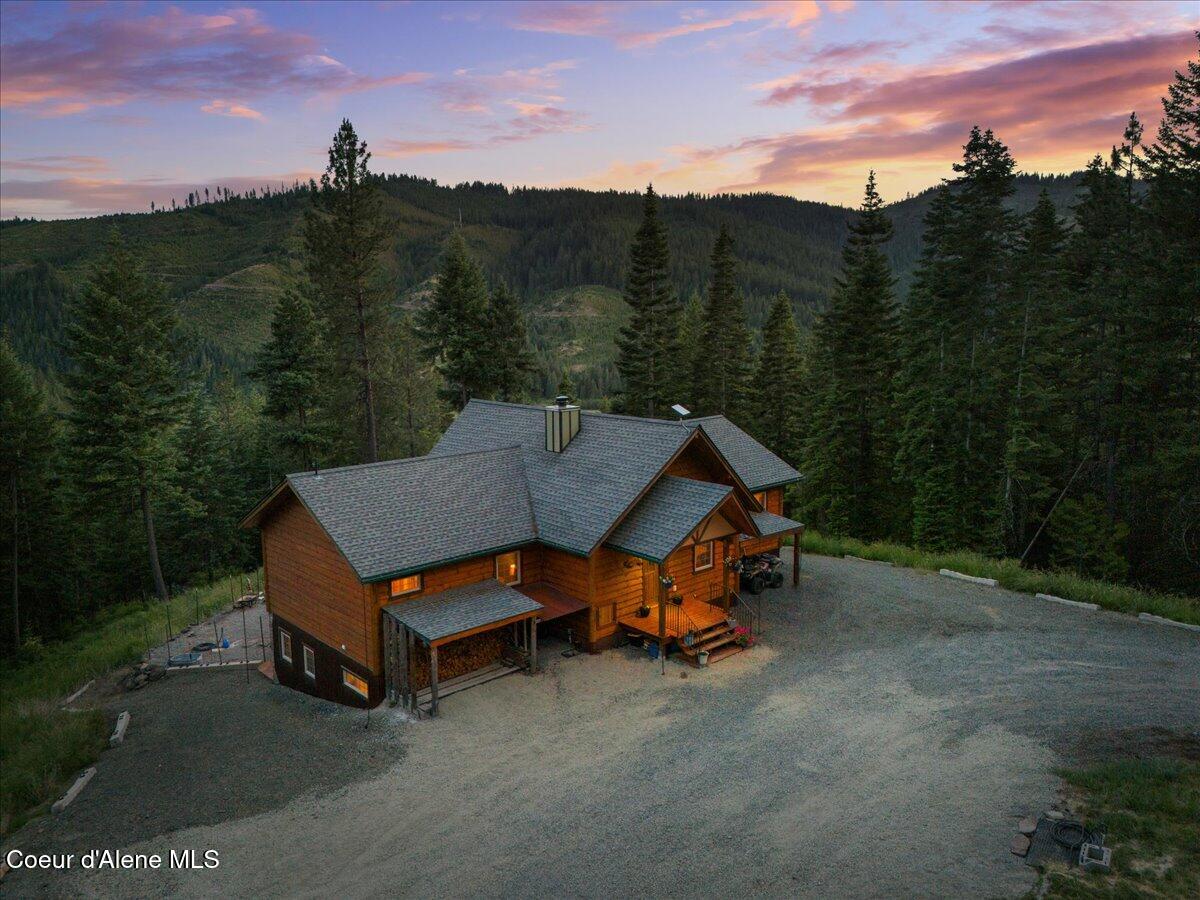 21807 East Doyle Road Cataldo, ID 83810 - Photo 5 of 80 04-Aerial front of home twilight