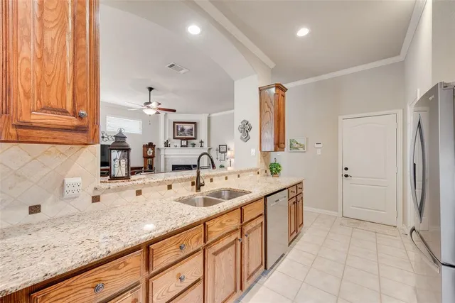 a spacious bathroom with a granite countertop sink and a mirror