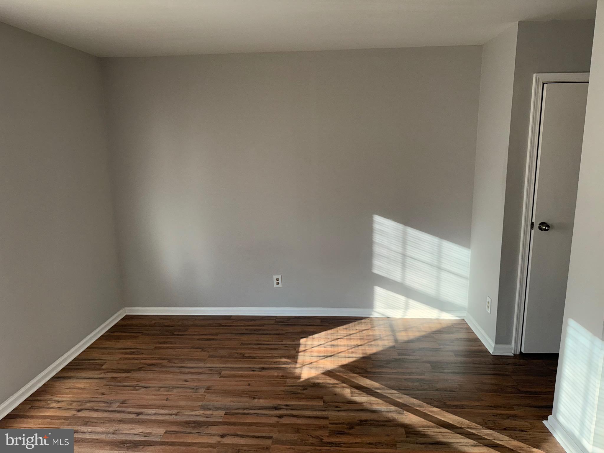 26 Hampton Gate Drive, Unit B Sicklerville, NJ 08081 - Photo 11 of 17 a view of wooden floor