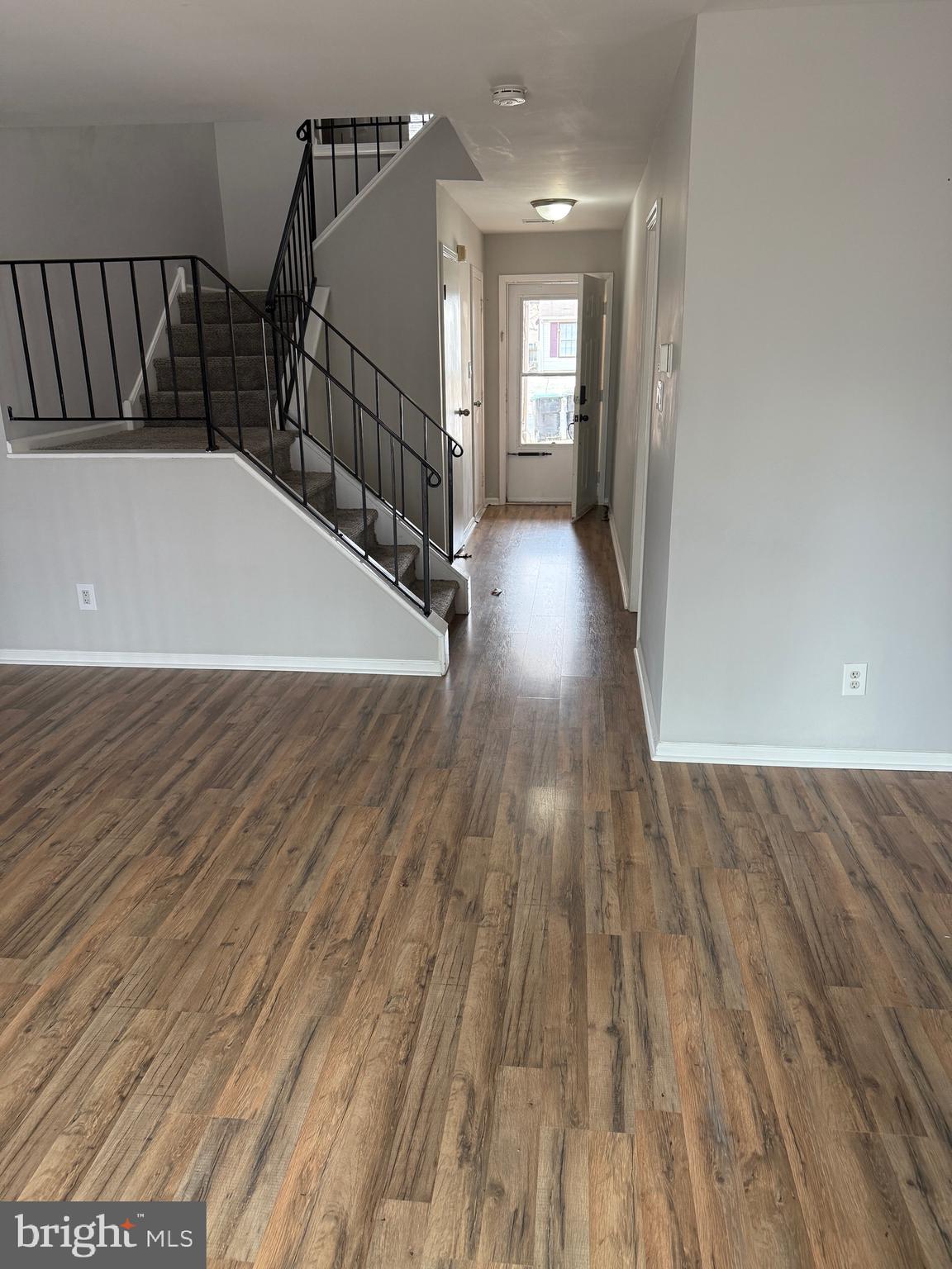 26 Hampton Gate Drive, Unit B Sicklerville, NJ 08081 - Photo 2 of 17 a view of a hallway with wooden floor