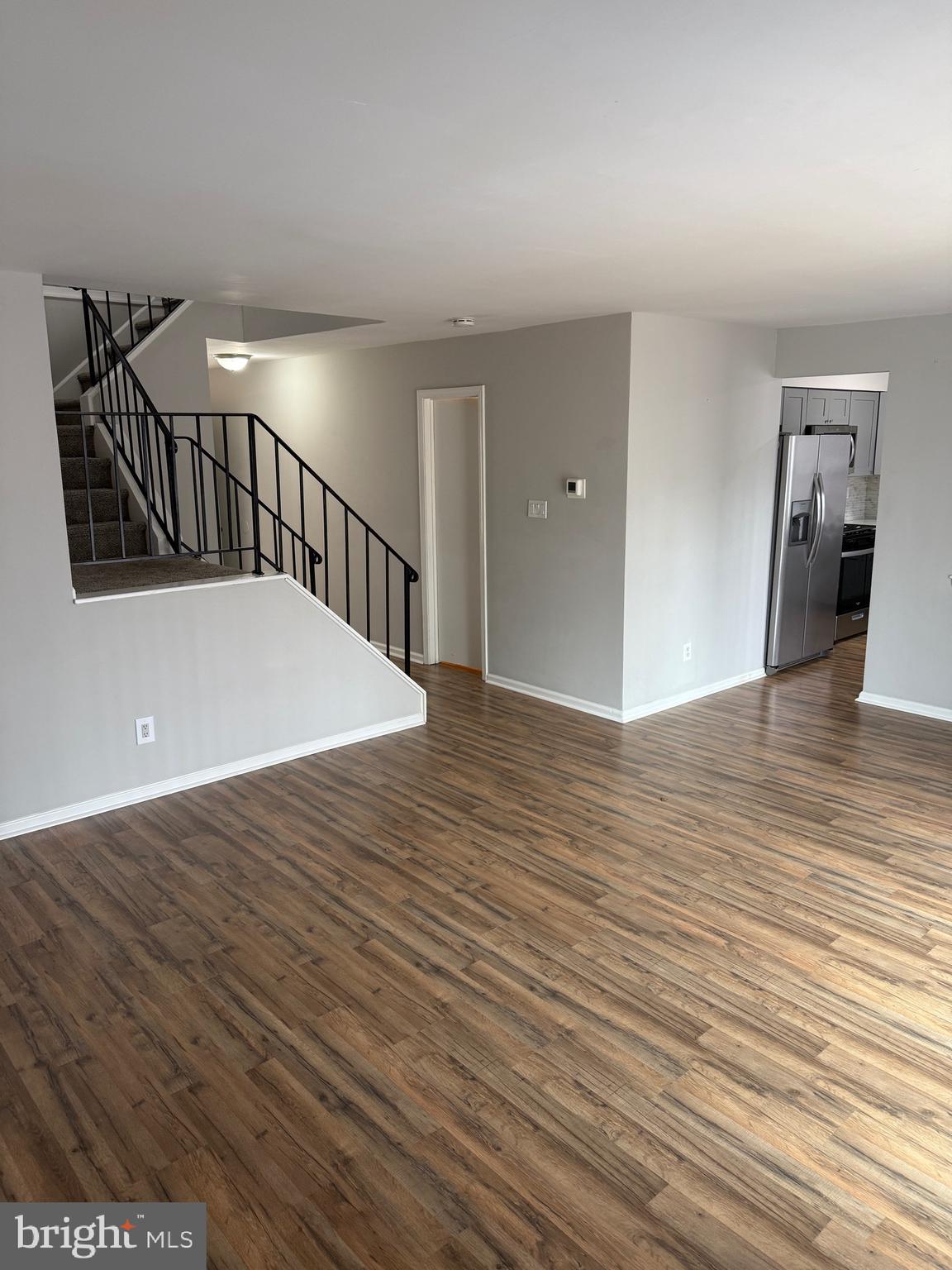 26 Hampton Gate Drive, Unit B Sicklerville, NJ 08081 - Photo 3 of 17 a view of a hallway with wooden floor