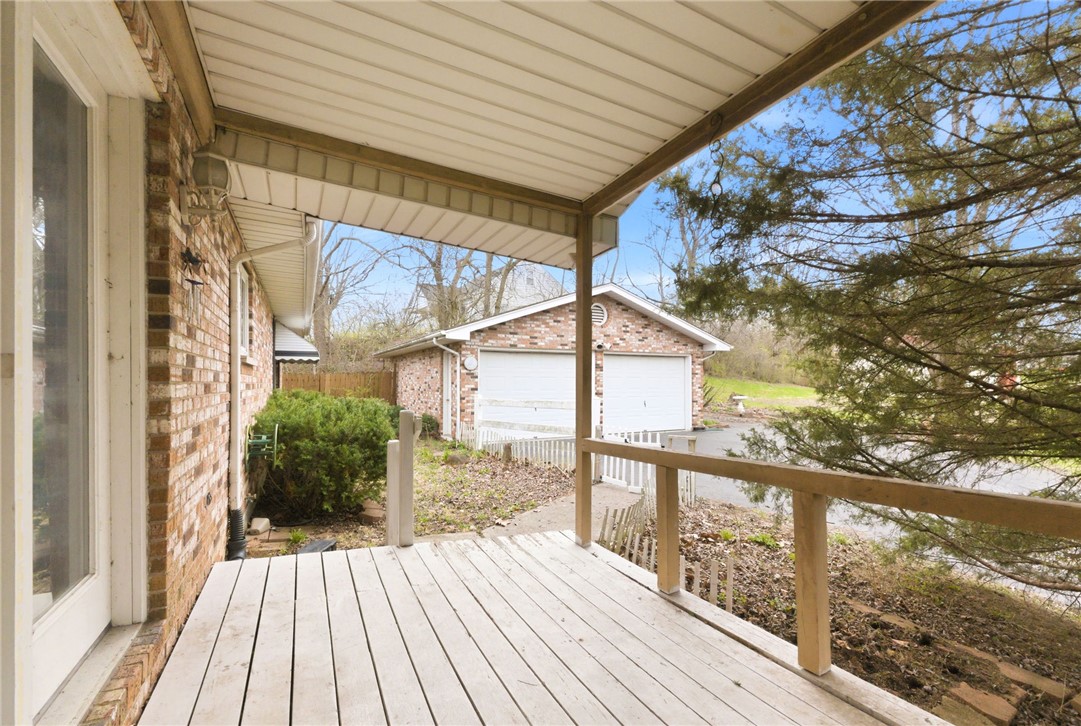 6711 Hamilton-Middletown Road Franklin, OH 45005 - Photo 32 of 49 This inviting patio offers a private outdoor retreat with convenient access to a detached garage.