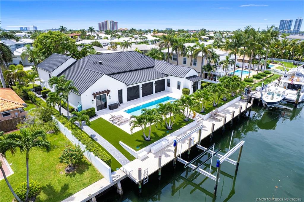 1110 Fairview Lane Riviera Beach, FL 33404 - Photo 69 of 76 New dock & lift, recently dredged, assuring no problems during low-tide hours