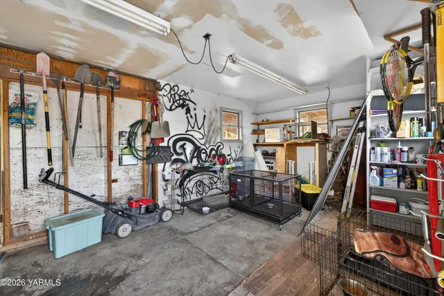 an aerial view of a house with a lake view