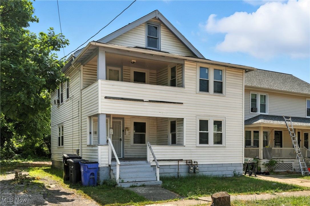 1774 Urbana Road Cleveland, OH 44112 - Photo 37 of 41 View of front of home with a porch and a balcony
