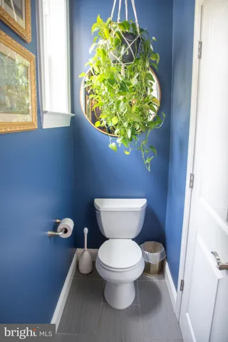 a bathroom with a toilet and a sink