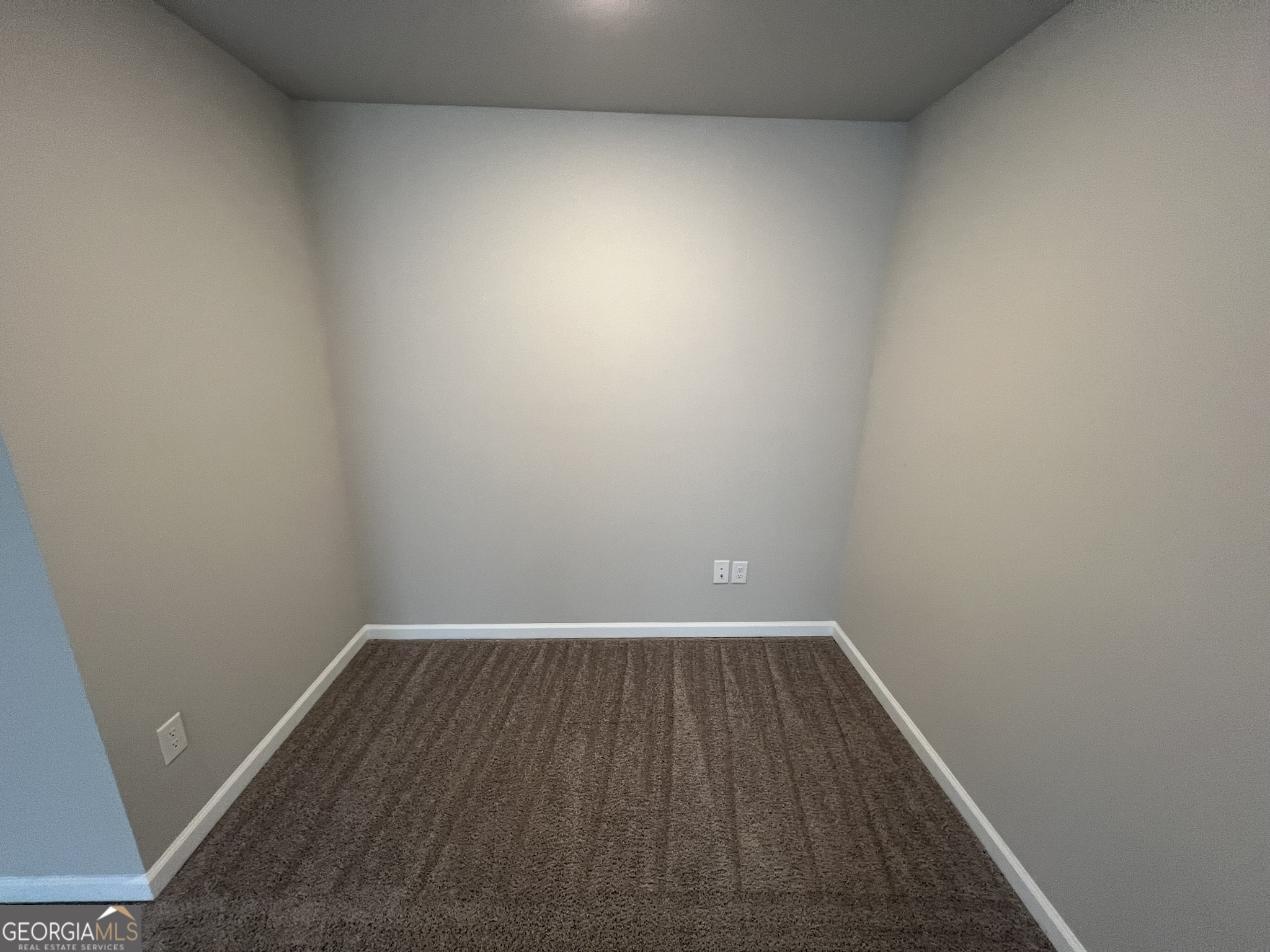 130 Skipjack Court Covington, GA 30016 - Photo 18 of 36 a view of room with wooden floor