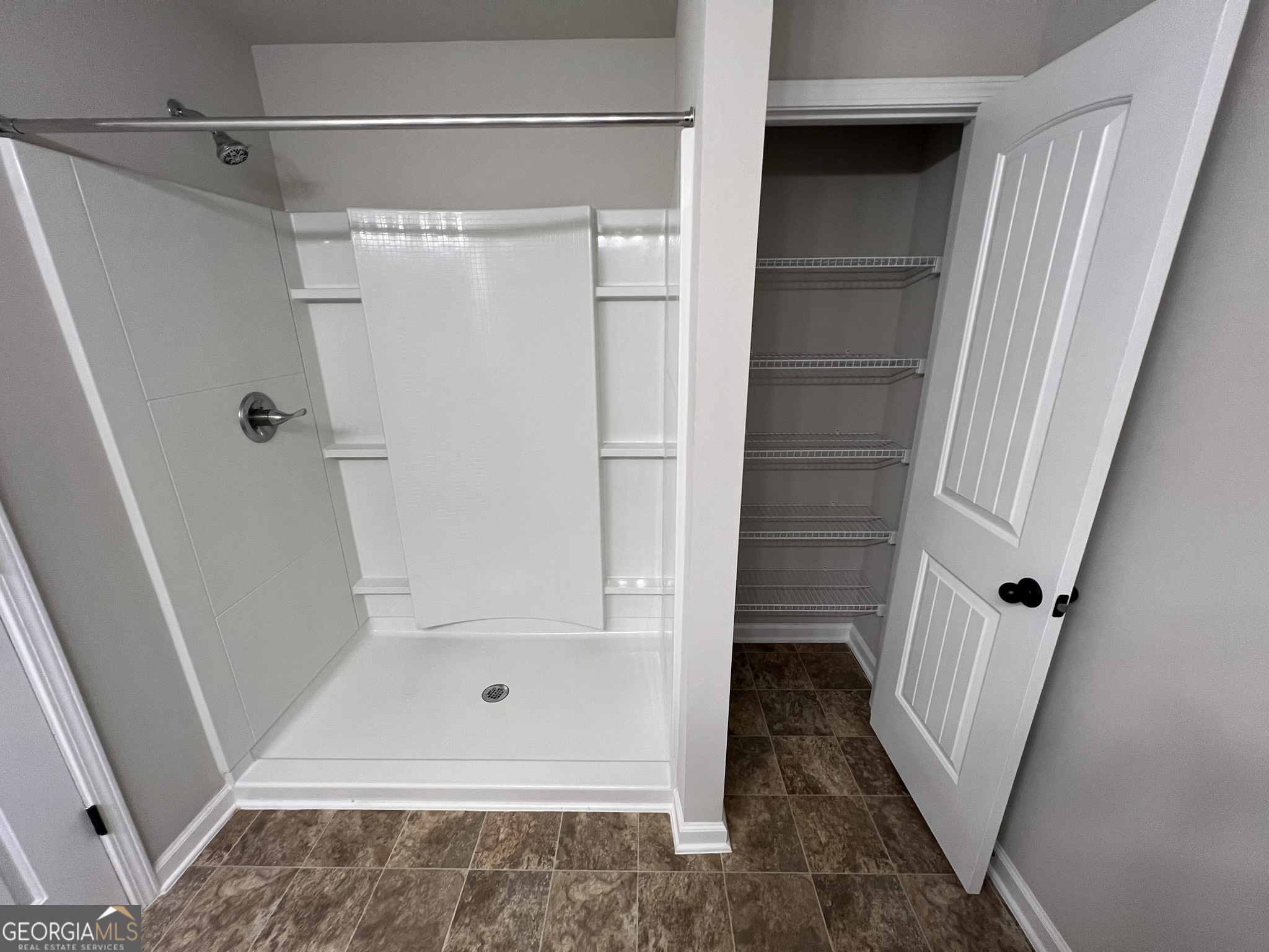 130 Skipjack Court Covington, GA 30016 - Photo 22 of 36 a view of walk in closet