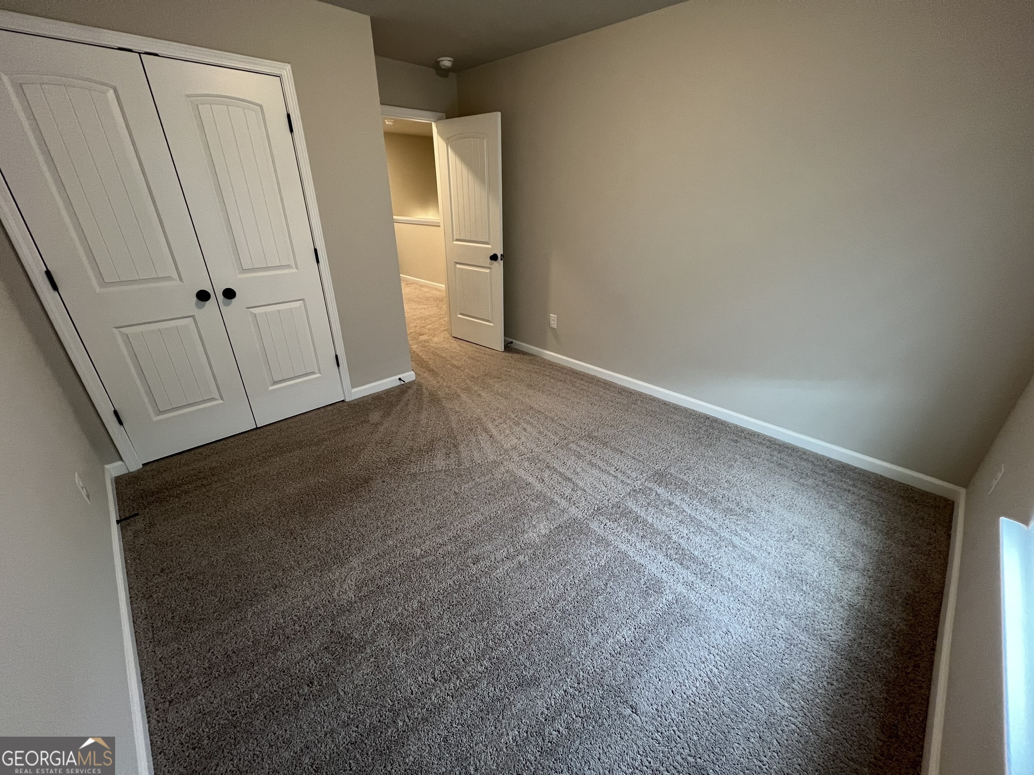 130 Skipjack Court Covington, GA 30016 - Photo 28 of 36 an empty room with wooden floor