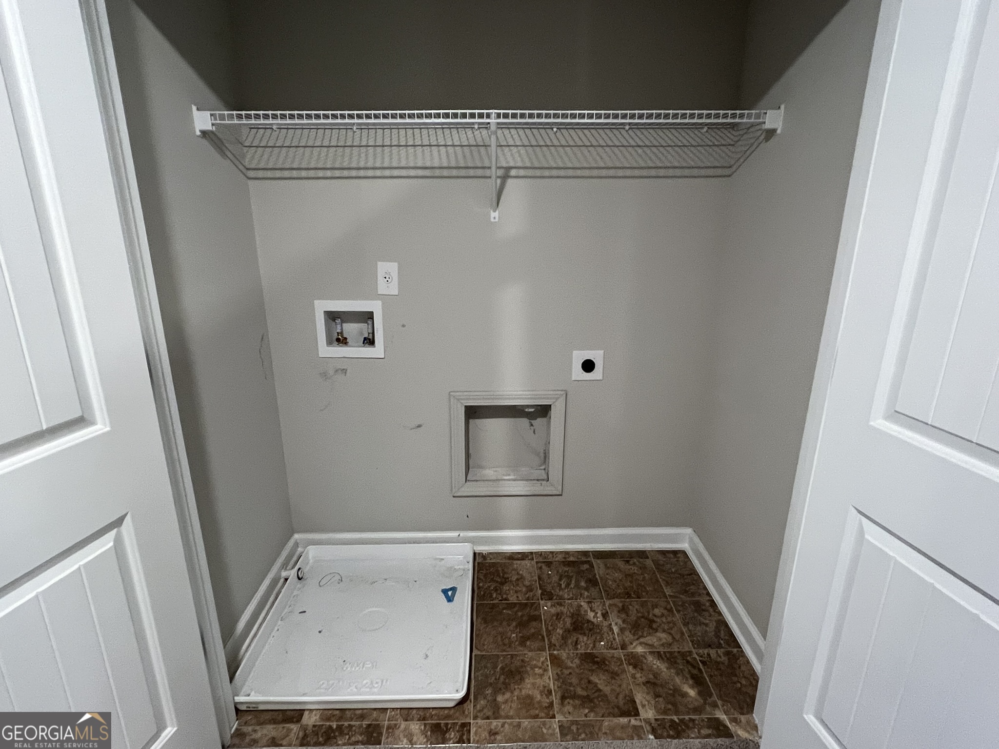 130 Skipjack Court Covington, GA 30016 - Photo 32 of 36 a bathroom with a tub and shower