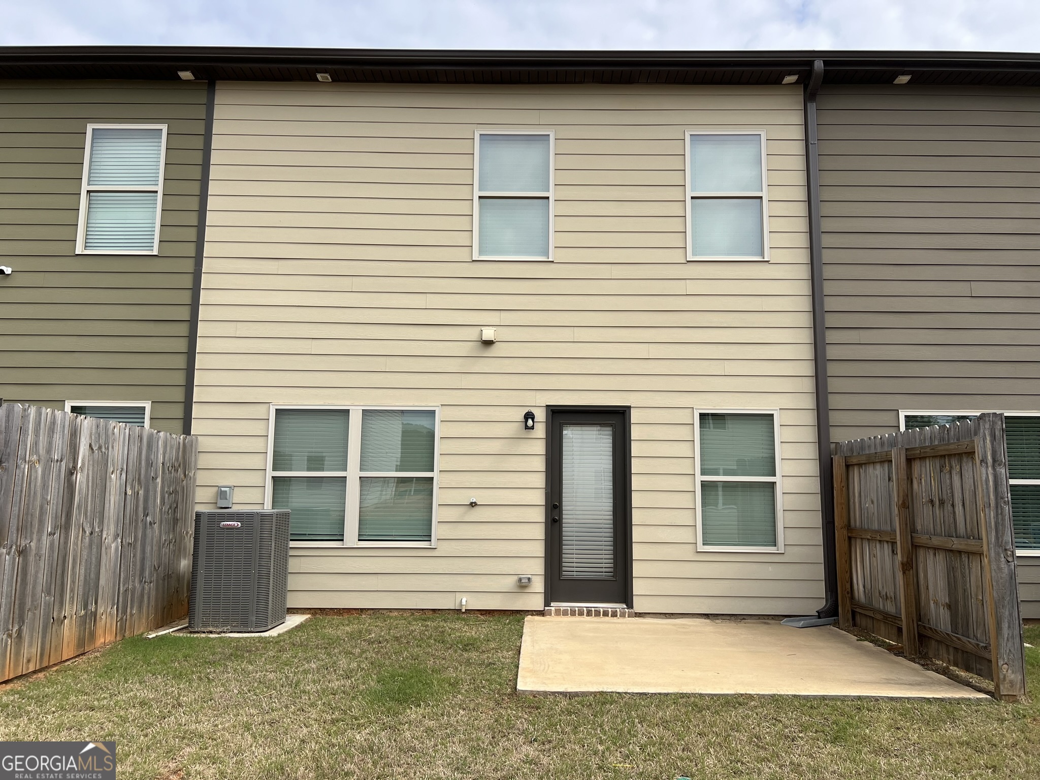130 Skipjack Court Covington, GA 30016 - Photo 36 of 36 a front view of a house with a garage