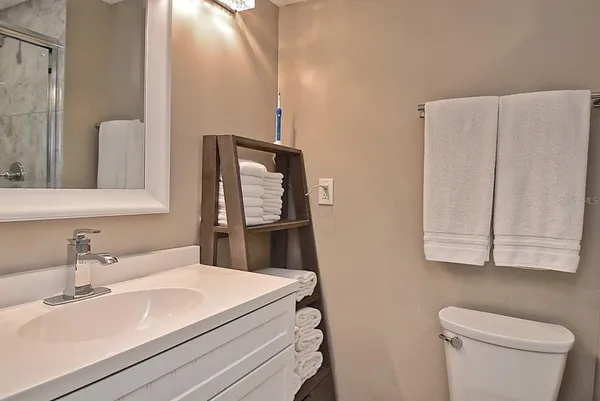 a room with a table and chairs