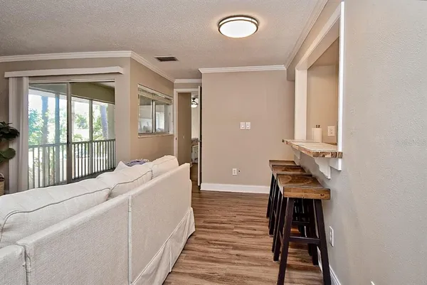 a room with a bed and a window