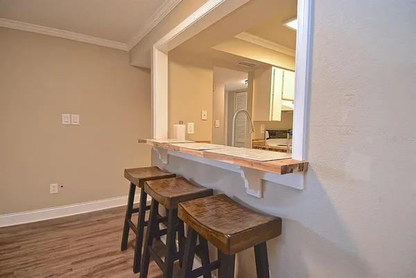 a room with a table and chairs