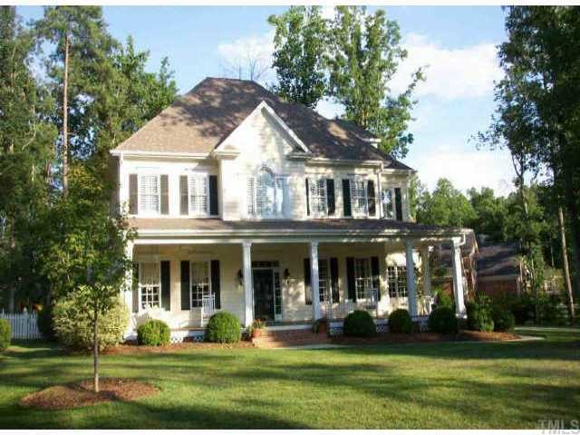 7109 Trenton Ridge Court Raleigh, NC 27613 - Photo 1 of 1 a front view of a house with a garden