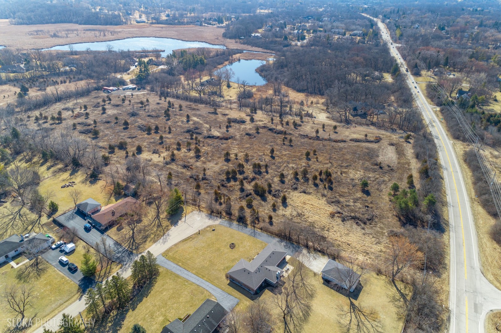 26049 Illinois Rte 59 Wauconda, IL 60084 - Photo 15 of 25 an aerial view of a house with a yard