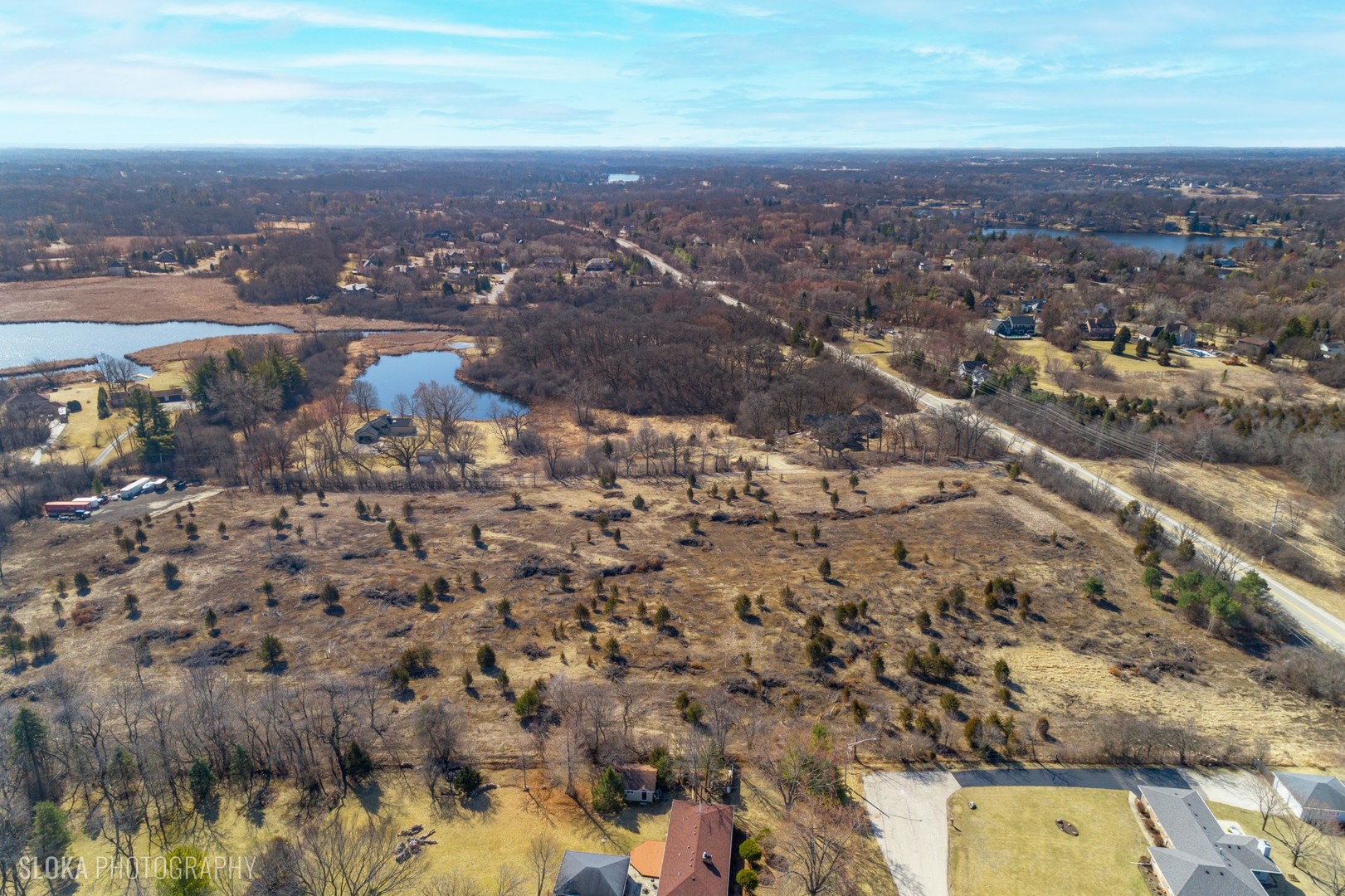 26049 Illinois Rte 59 Wauconda, IL 60084 - Photo 16 of 25 an aerial view of multiple house