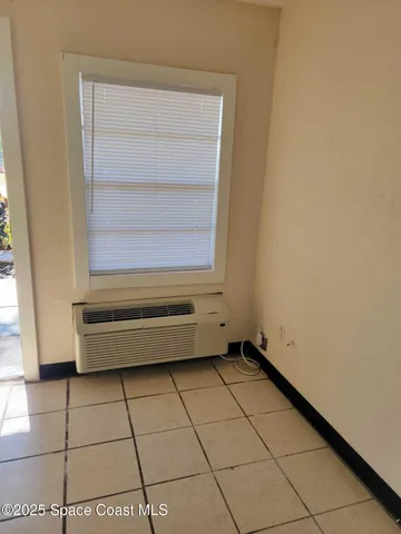 a bathroom with a sink a mirror a toilet and vanity