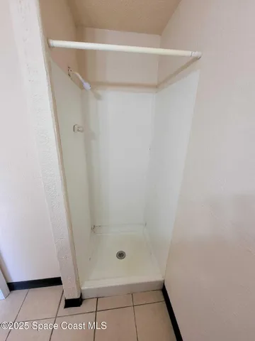 a view of swimming pool with sitting area