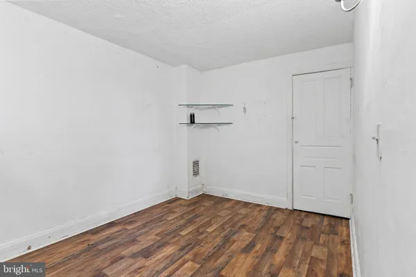 an empty room with a workbench